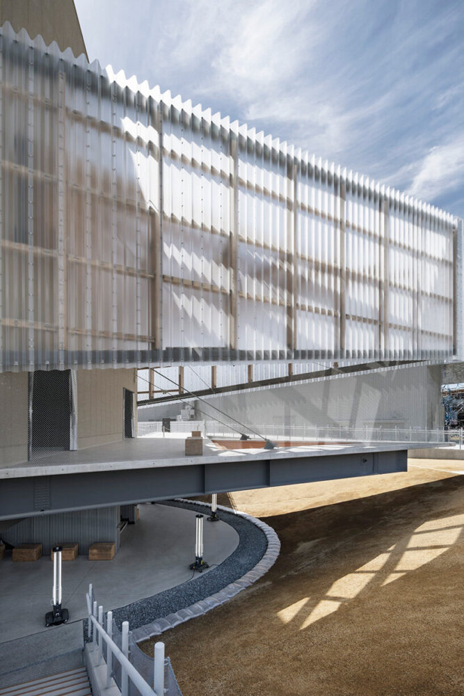 view of the triangular Sankaku Park from the exhibition approach