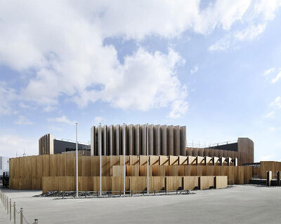 oki sato & nikken sekkei's expo 2025 osaka pavilion places biogas plant amid timber ring
