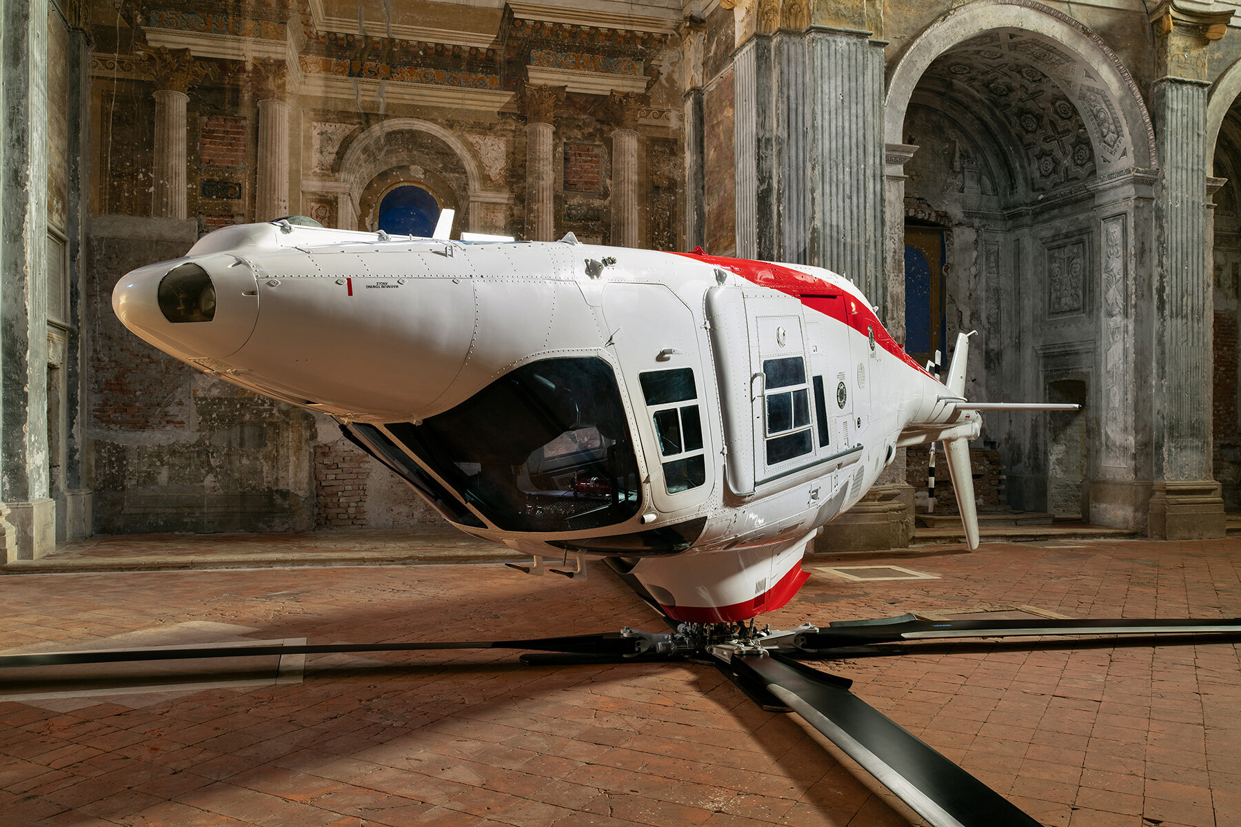paola-pivi-helicopter-upside-down-17th-century-church-cremona-italy-designboom-large01
