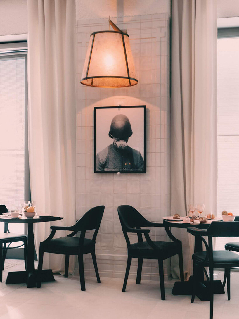 philippe starck places 19th-century house atop monolithic structure for french hotel