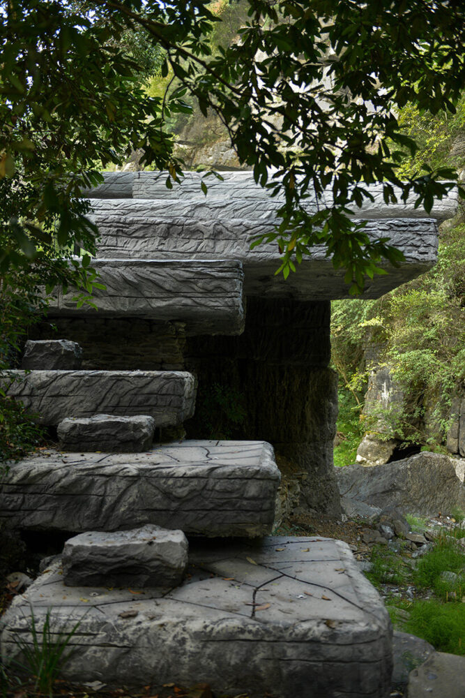 the stone inspired the architects to turn it into a contemplative resting space | image by DoDesign