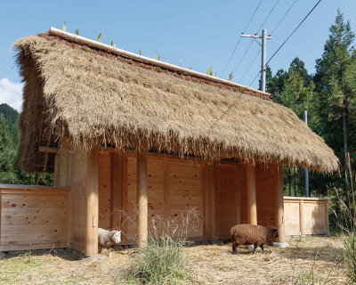 studio 2m26 shapes wooden sheep house in kyoto with rice straws and sewn bamboo nets