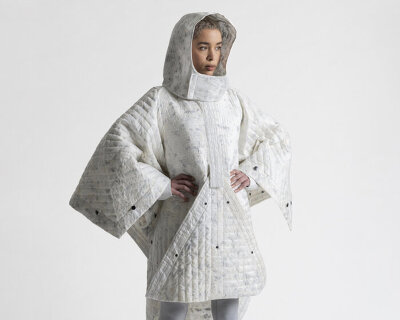 LAYER recycles parachutes into RÆBURN’s cape and jacket that can be worn in any weather