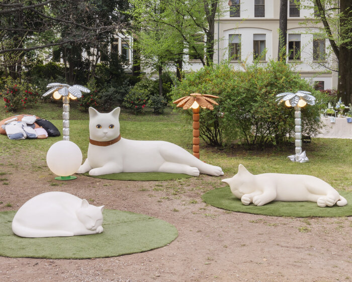 MCM and pet therapy reveal poufs shaped like cats and dogs at giardino delle arti in milan