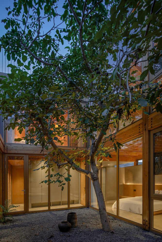 reclaimed bricks from the site lend texture and memory to the walls