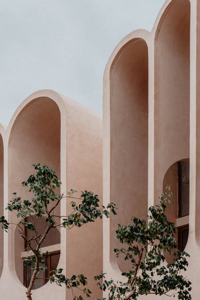 arched thresholds frame shifts in scale and perception