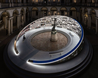 es devlin's rotating library installation illuminates historic courtyard at milan design week