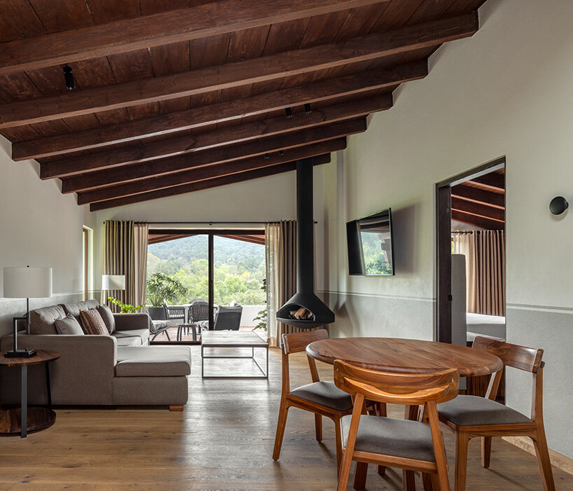 suspended fireplaces introduce contemporary comfort into private lounges