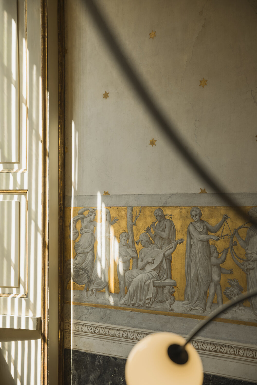 michael anastassiades on suspending modular lighting amid frescoed halls of milanese villa