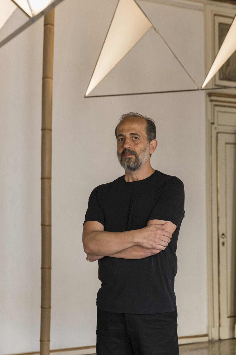 michael anastassiades on suspending modular lighting amid frescoed halls of milanese villa