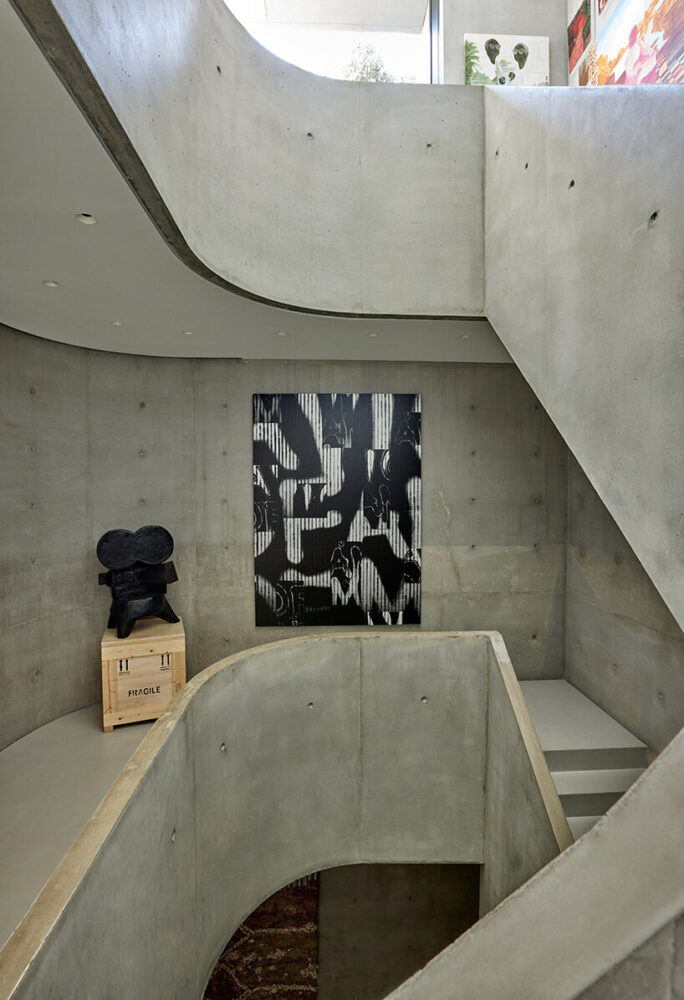 the gallery defies convention with its softly rounded corners