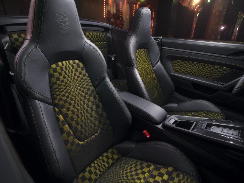 the seats bear the Pasha fabric pattern, which is is similar to waving checkered flags