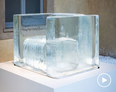 tokujin yoshioka's sculptural chairs made from frozen water melt during milan design week