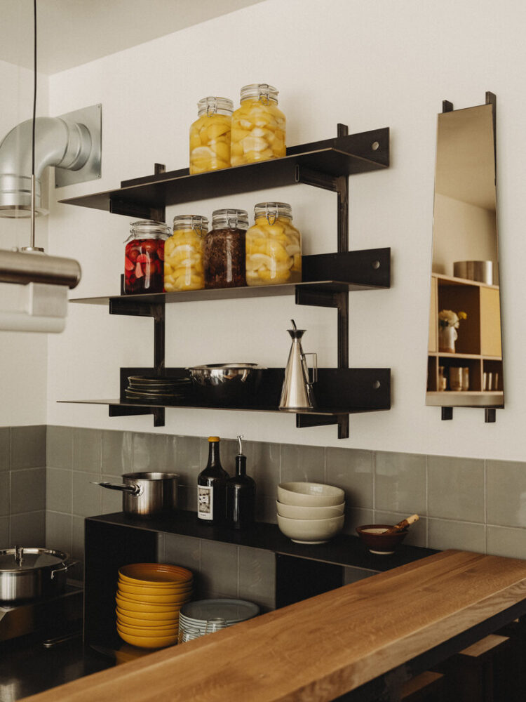 raw steel frames and handcrafted joints lend the furniture an unfinished charm