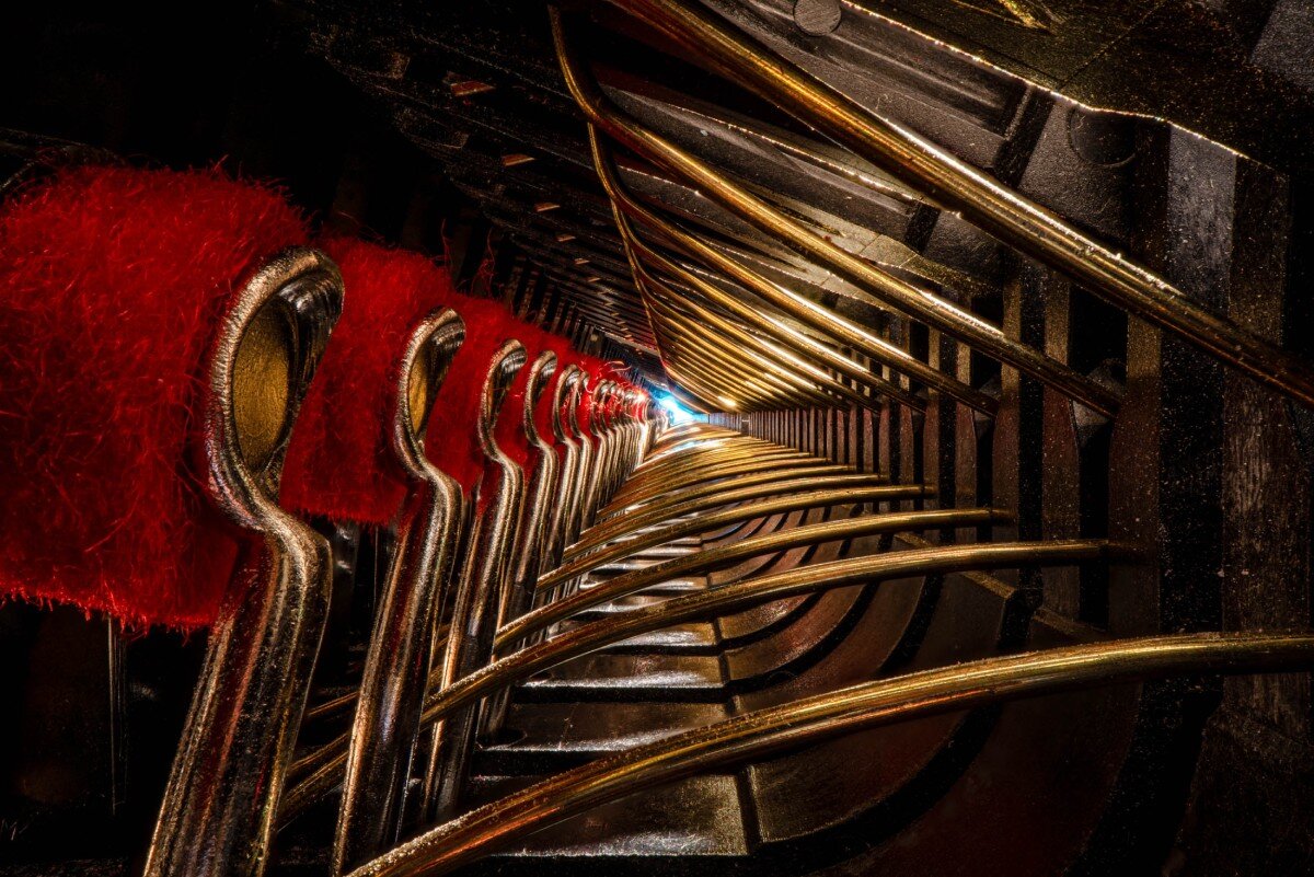 charles brooks captures vaulted, shaded spaces inside historic musical instruments