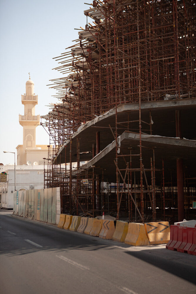 prefabricated concrete columns, just 25–30 centimeters thick, are reinforced with bent steel plates