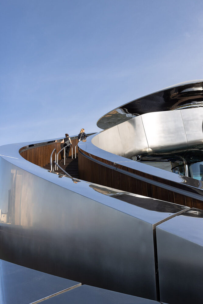 revealing how the staircase captures and transforms natural light