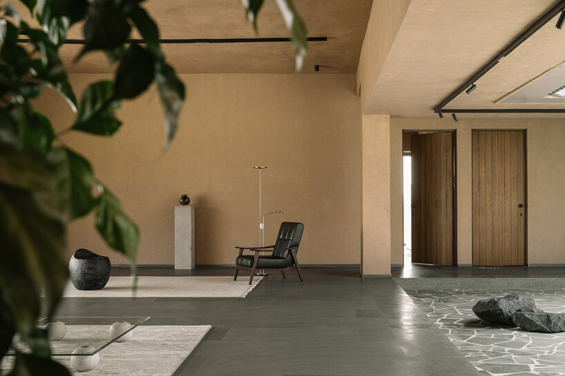 a framed glimpse from the foyer connecting the living area to the courtyard