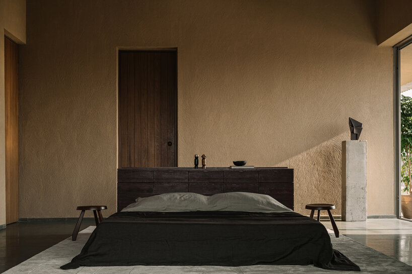 bedroom setting emphasizes proportion, calm, and material warmth