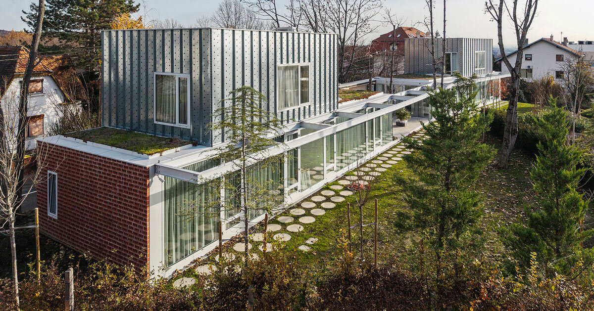 perforated brick facade clads double villa bukovac by njiric+