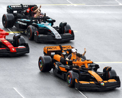 full-size F1 cars made of LEGO bricks drive around miami grand prix
