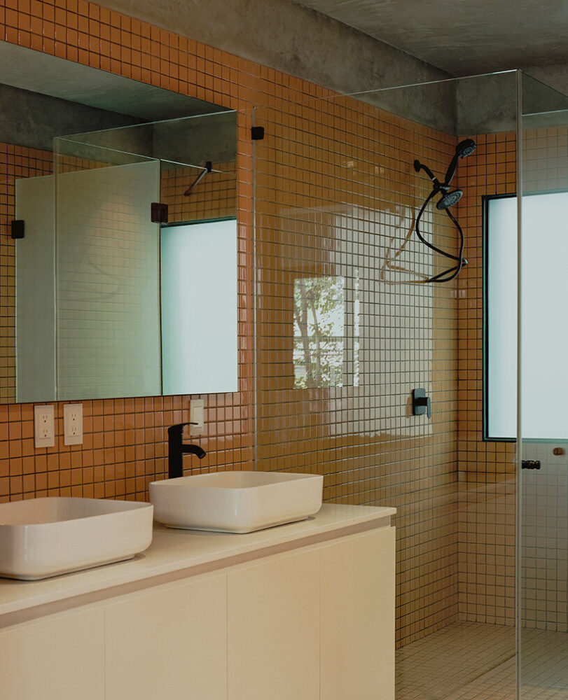 yellow tiles clad the walls and the floor