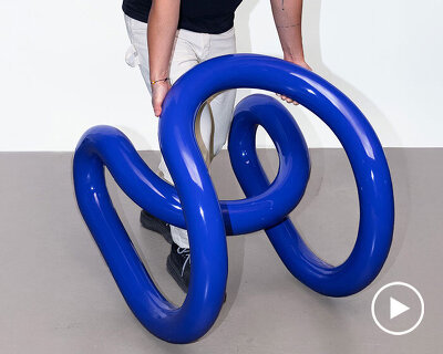 nik bentel studio bends single, unbroken loop of steel into sculptural chair