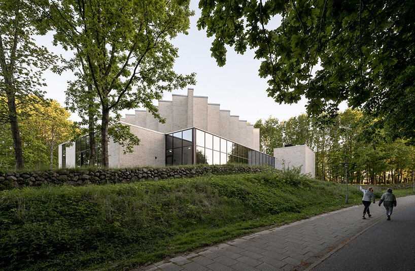 the subtle curves of the facade help modulate the light further