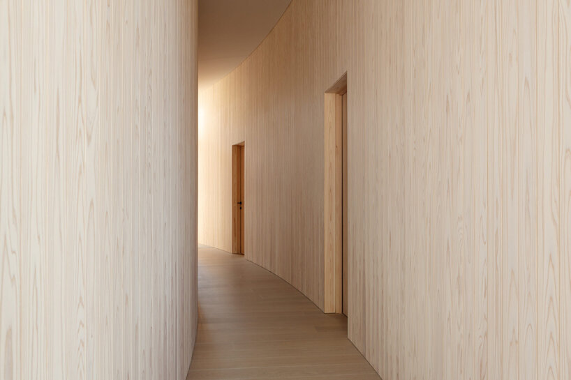 radiating from the corridor are variously scaled rooms