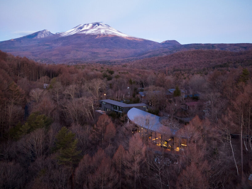 the project is nestled in the forested hills of Karuizawa, Japan