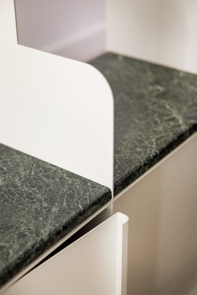 detail of the hallway furniture with the Tinos marble countertop