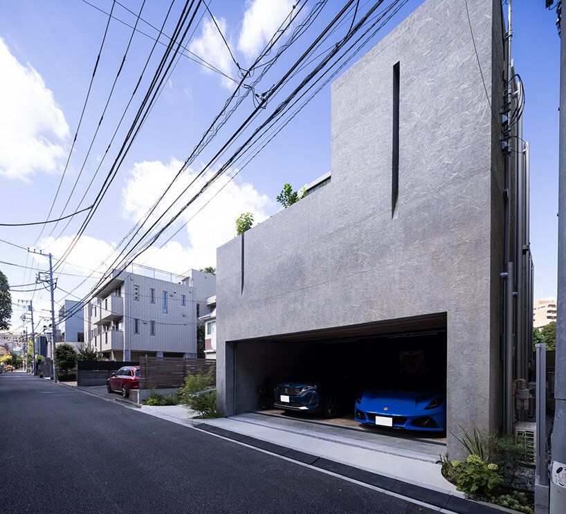 water flows along uncovered gutters, down the exterior walls