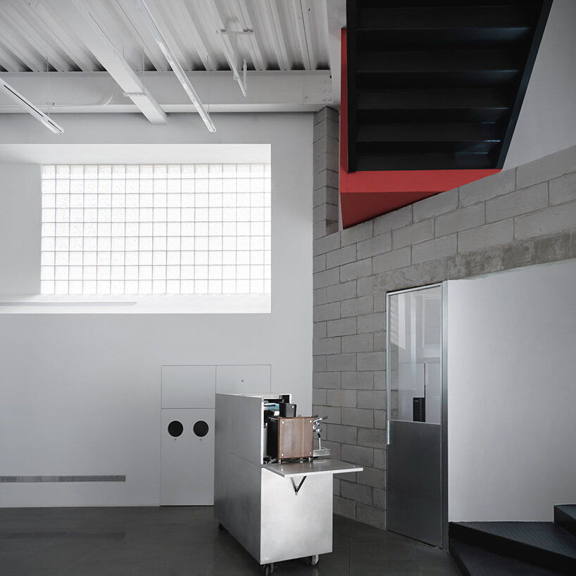 parts of the wall are covered with glass bricks | image by Atelier Siyu