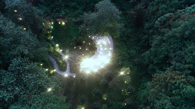 hovering like a feather caught mid-fall