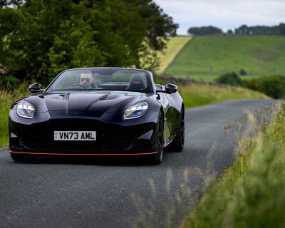 design drive: aston martin vanquish volante convertible exhilarates rain or shine