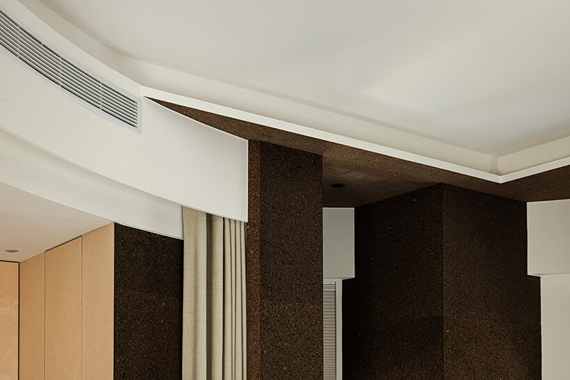 the curtain turns the simple act of entering into a quiet ritual