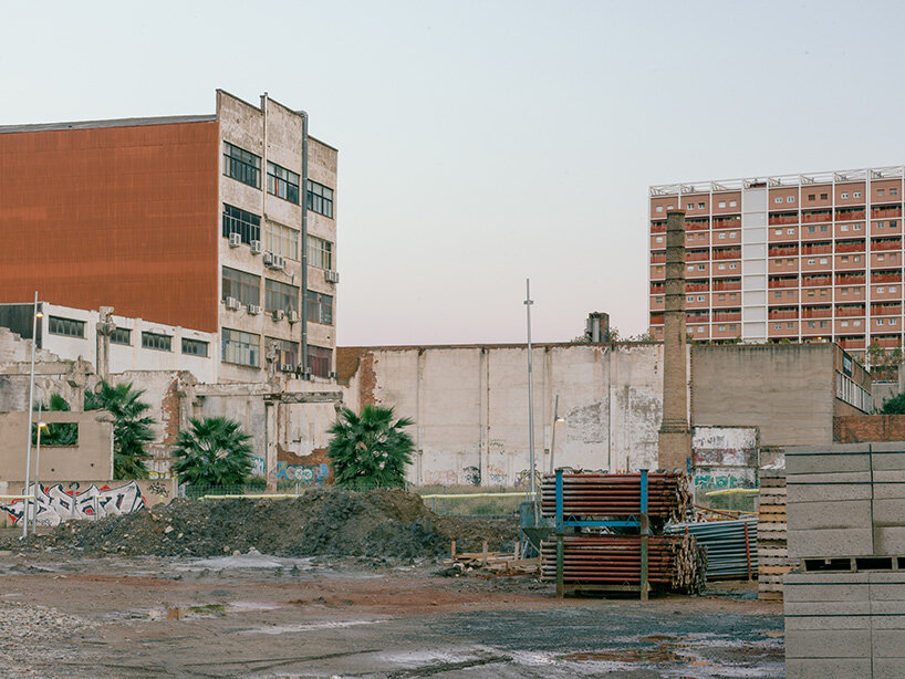 the warehouse is tucked inside a mixed-use block still bearing traces of its industrial past