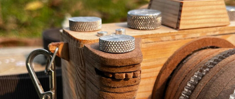 while the main body and material are wood, the design uses metal and acrylic for the details