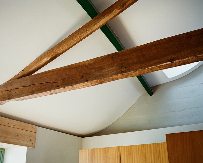 a new structural beam supports the existing truss