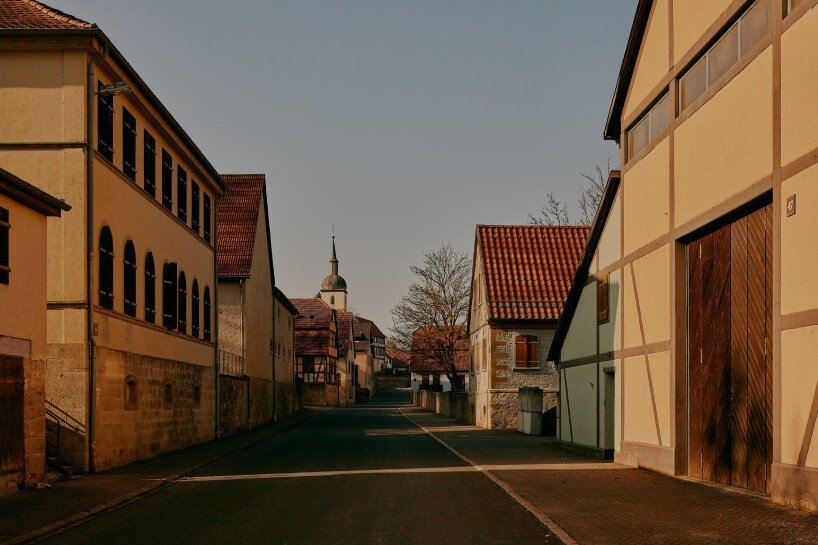 david altrath captures eerie stillness of bonnland, an abandoned military village in germany