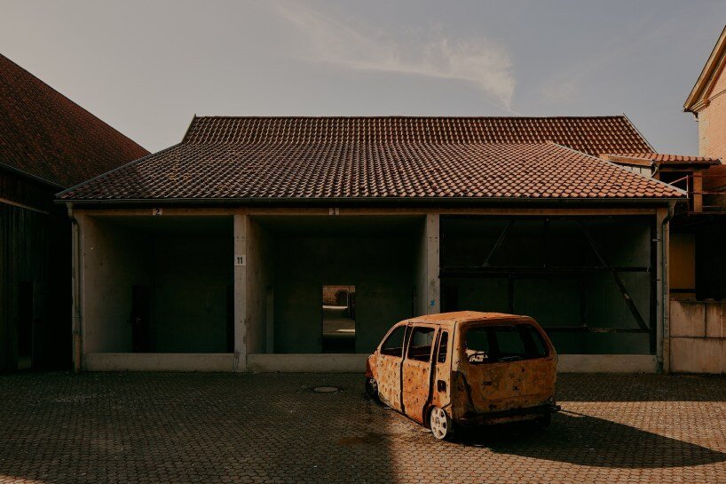 david altrath captures eerie stillness of bonnland, an abandoned military village in germany