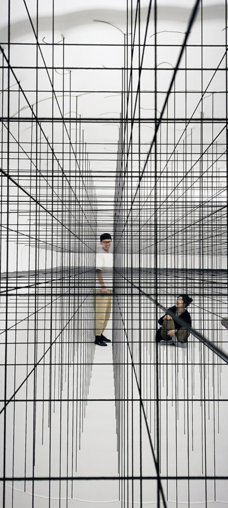 visitors are encouraged to enter and interact with these suspended worlds