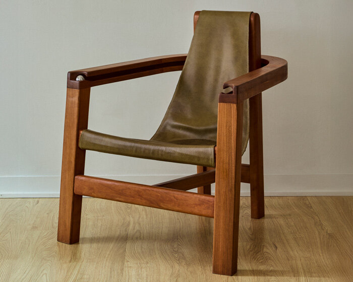 steel ball set into armrest of tanuvi hegde's 'reflect' chair for fidget-friendly design