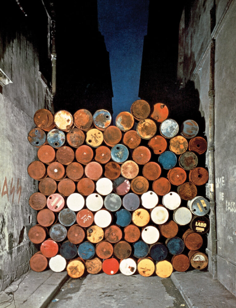 Christo and Jeanne-Claude, Wall of Oil Barrels—The Iron Curtain, Rue Visconti, Paris, 1961-62, Paris, 1962 | photo by Jean-Dominique Lajoux © 1962 Christo and Jeanne-Claude Foundation