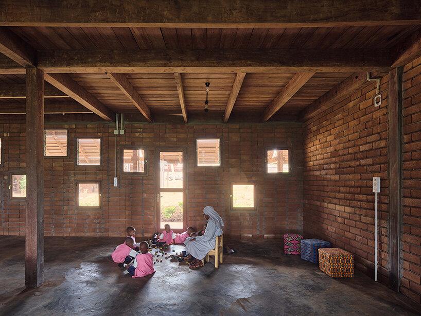 the design of the school focuses on using local materials and simple construction techniques