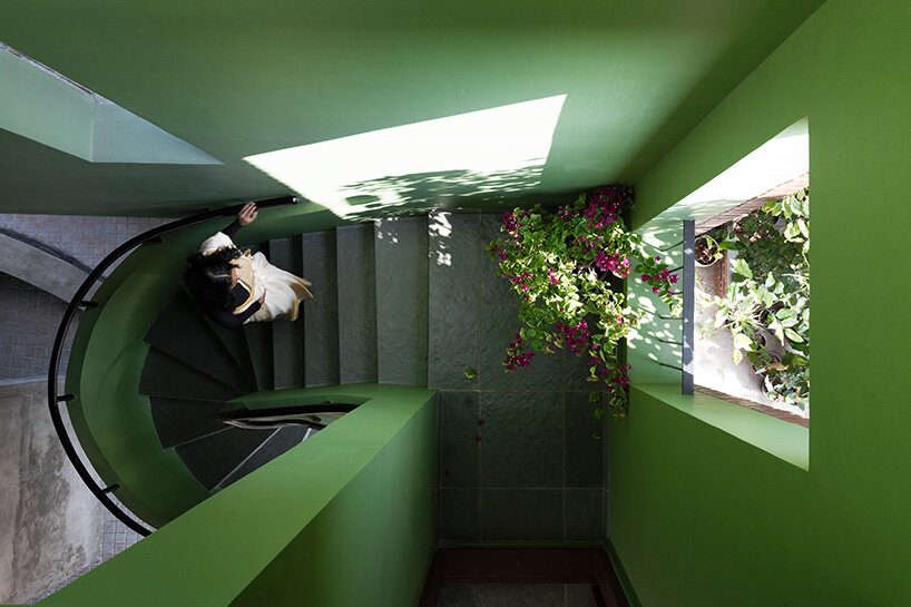 the staircase narrows, and the volumes become more intimate