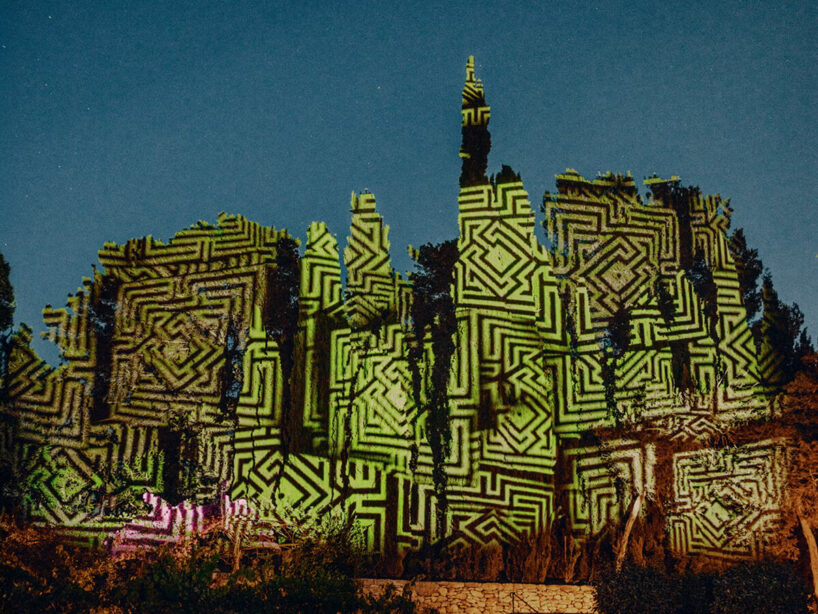 a site-specific light projection is designed by artist Javier Riera