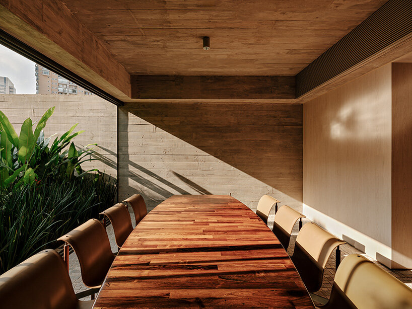 technical components are concealed behind wooden panels 