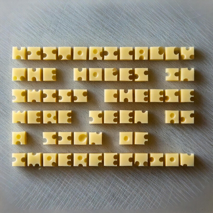 the holes are intentionally placed to let the letters stand out