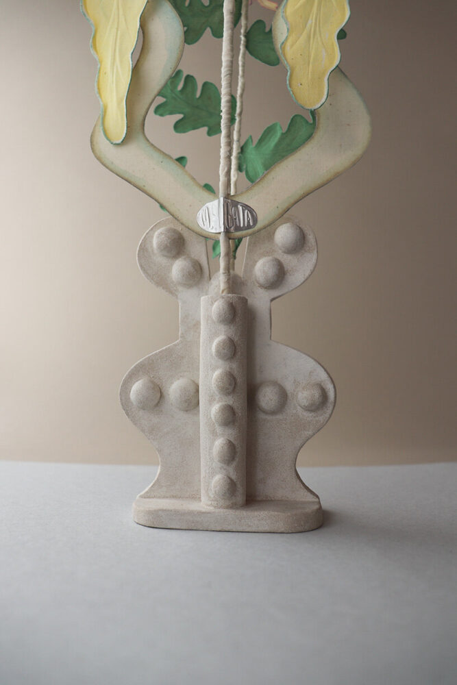 the ceramic base represents the land god